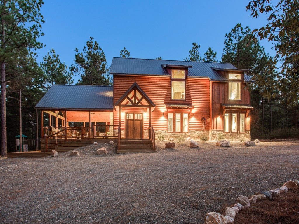 Cabin exterior featuring rustic accents and natural beauty