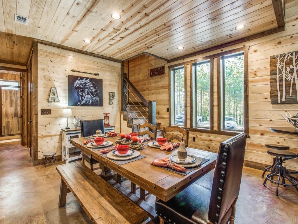 Open concept design connecting the cabin's kitchen and dining area